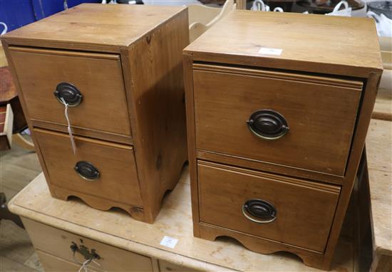 A pair of pitch pine two drawer cabinets, H.52cm